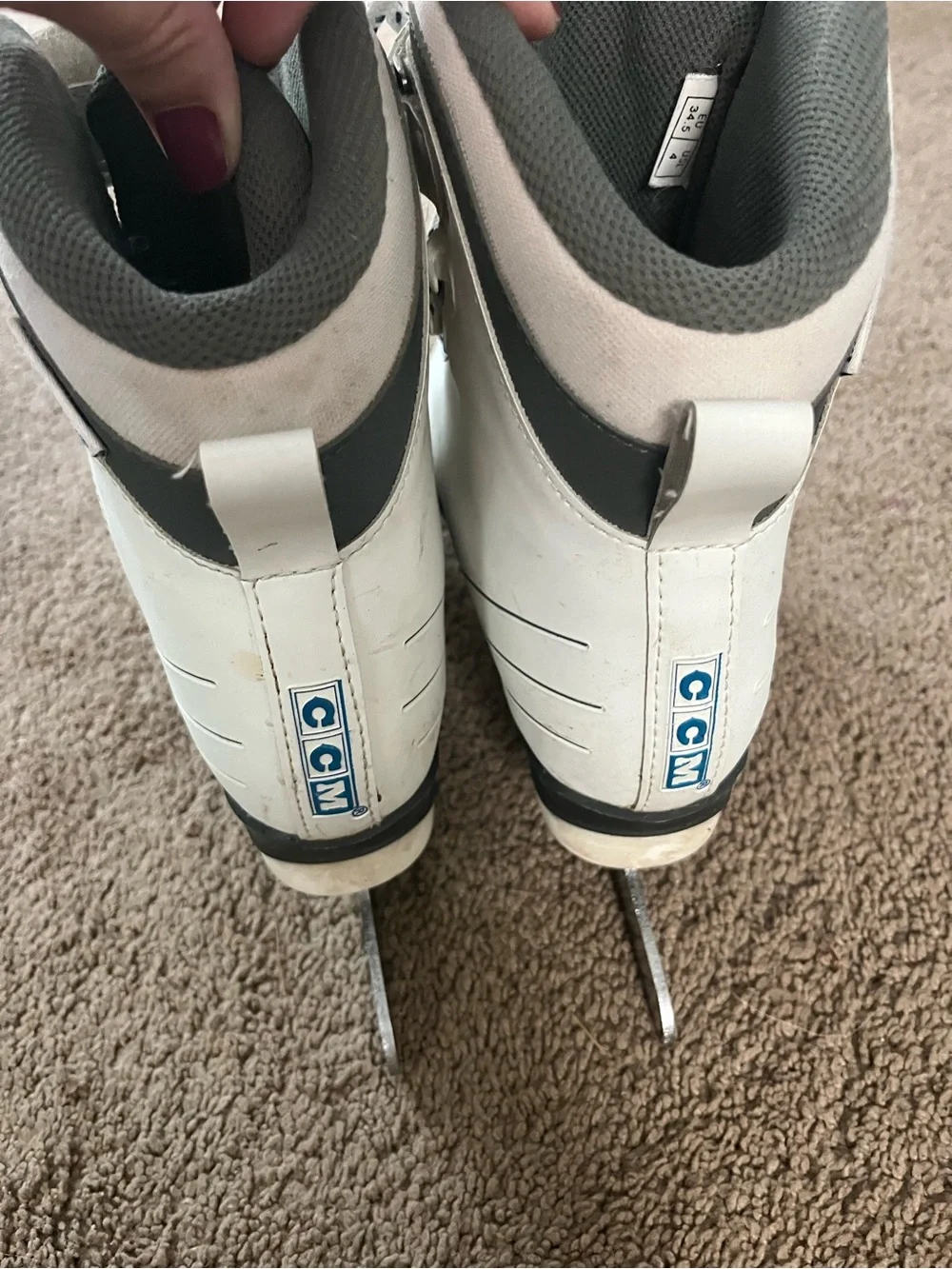 CCM White and Ice Skates with Navy Accents